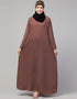 Trendy Abaya made from Nida fabric with a flared hem for a feminine touch In Color Light brown
